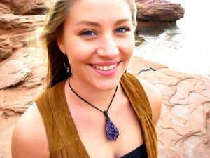 Woman wearing Amethyst crystal macrame necklace