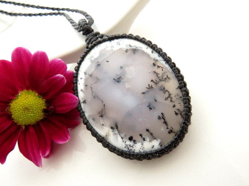 Model wearing Dendrite Opal (Merlinite) gemstone necklace, macrame necklace wrapped in black cord