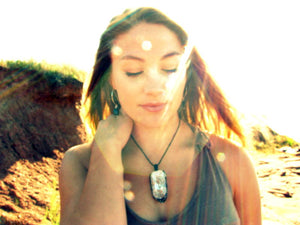 model wearing a quartz crystal necklace