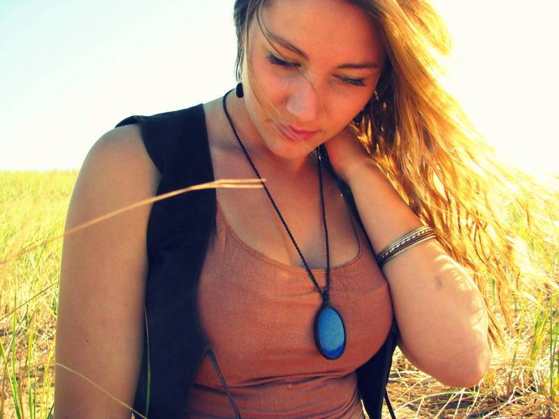 woman wearing Lapis Lazuli gemstone pendant