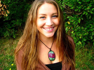 woman wearing ruby zoisite gemstone necklace