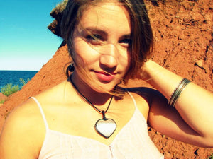 Model wearing pretty white Selenite crystal necklace, Selenite heart shaped crystal necklace