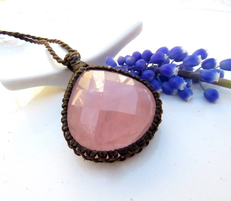 Model wearing a soft pink teardrop Rose quartz crystal necklace, wrapped Rose Quartz necklace