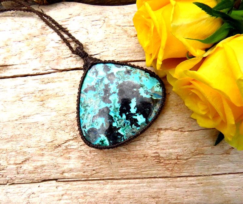 model wearing large teardrop Azurite gemstone necklace, pretty blue azurite macrame necklace wrapped in dark brown (almost black) cord