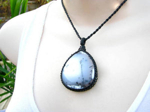 a very pretty teardrop Dendrite Opal macrame necklace, black and white merlinite gemstone necklace