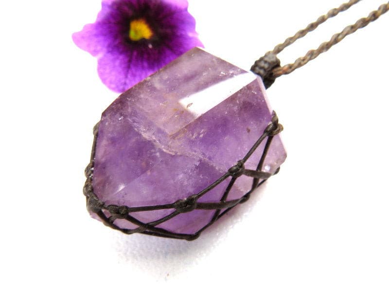 Amethyst crystal point macrame necklace.