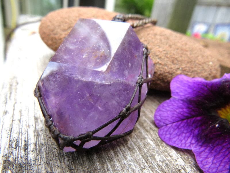 Amethyst crystal point macrame necklace.