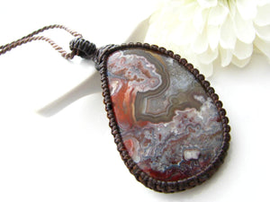 Mesmerizing Crazy Lace Agate gemstone necklace, gray with red banding, teadrop shaped mexican agate